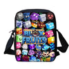 A black backpack featuring a colorful design of various cartoon fruits and vegetables.
