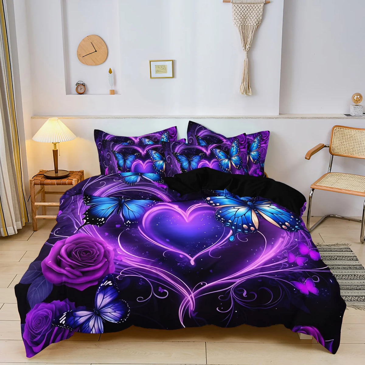 A purple and blue duvet cover featuring a large heart design surrounded by roses and butterfly accents.