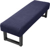 A dark blue Jacquard stretch bench cover with a woven texture and black frame.