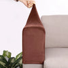 A close-up of a dark brown velvet sofa armrest cover being held by a hand, resting on a light gray sofa.