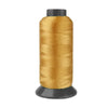 A roll of heavy duty 3-ply nylon sewing thread with a gold color.