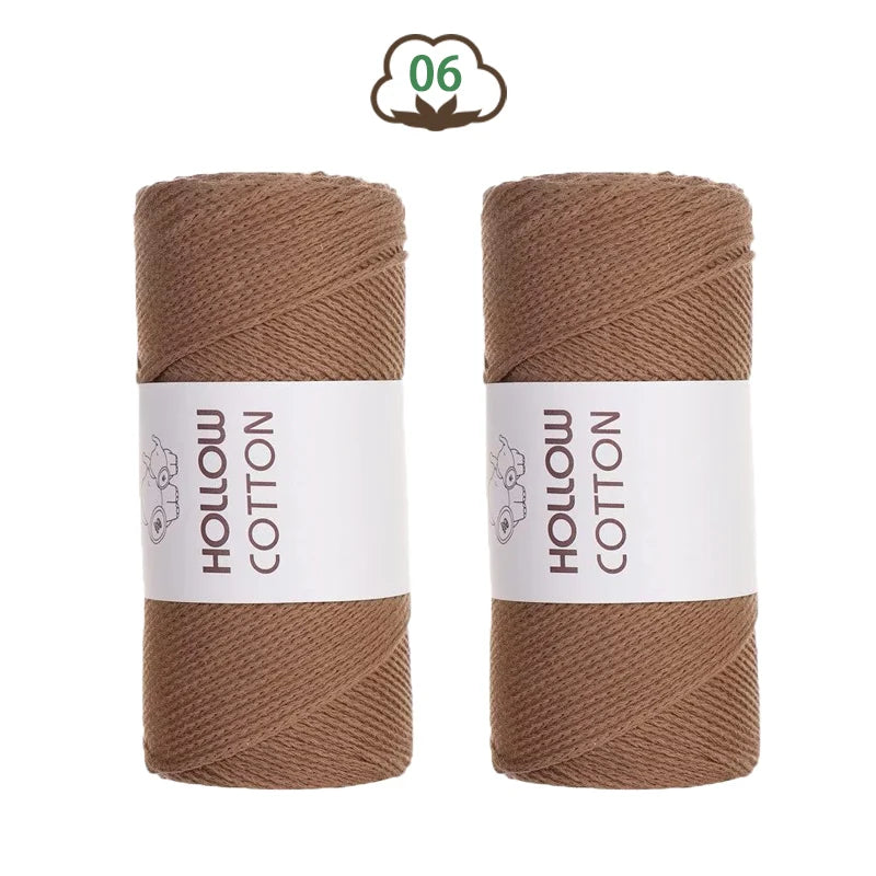 Two spools of brown hollow cotton yarn for DIY crafting