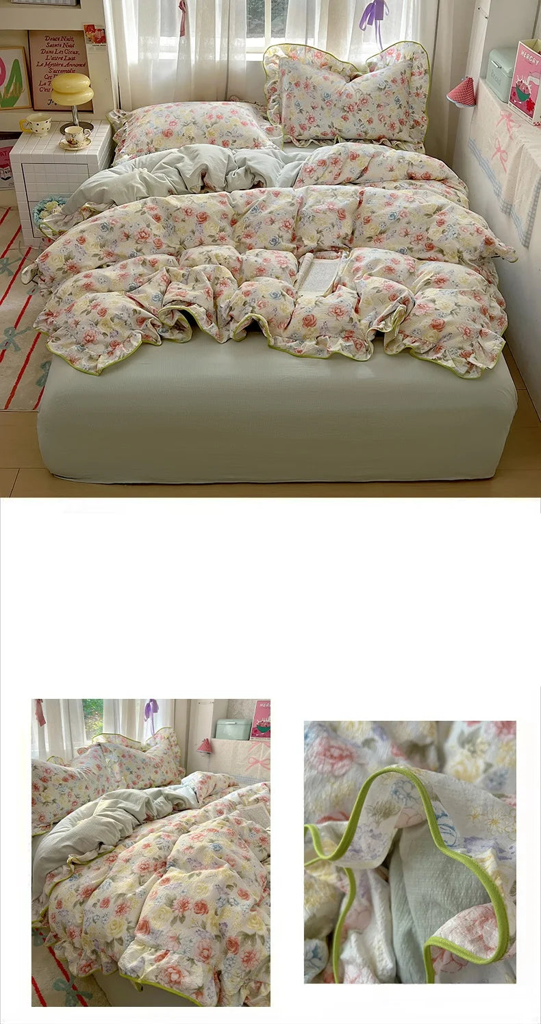 A floral bedding set featuring light pink and green patterns is displayed on a bed with white linens.