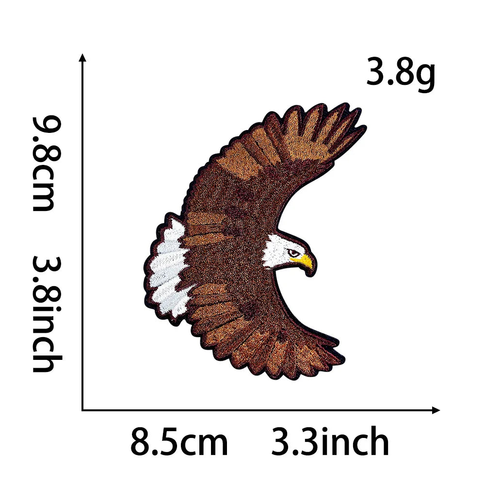 A brown and white eagle embroidery patch shown in profile view with dimensions provided.