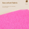 Close-up of a bright pink sea velvet fabric texture.