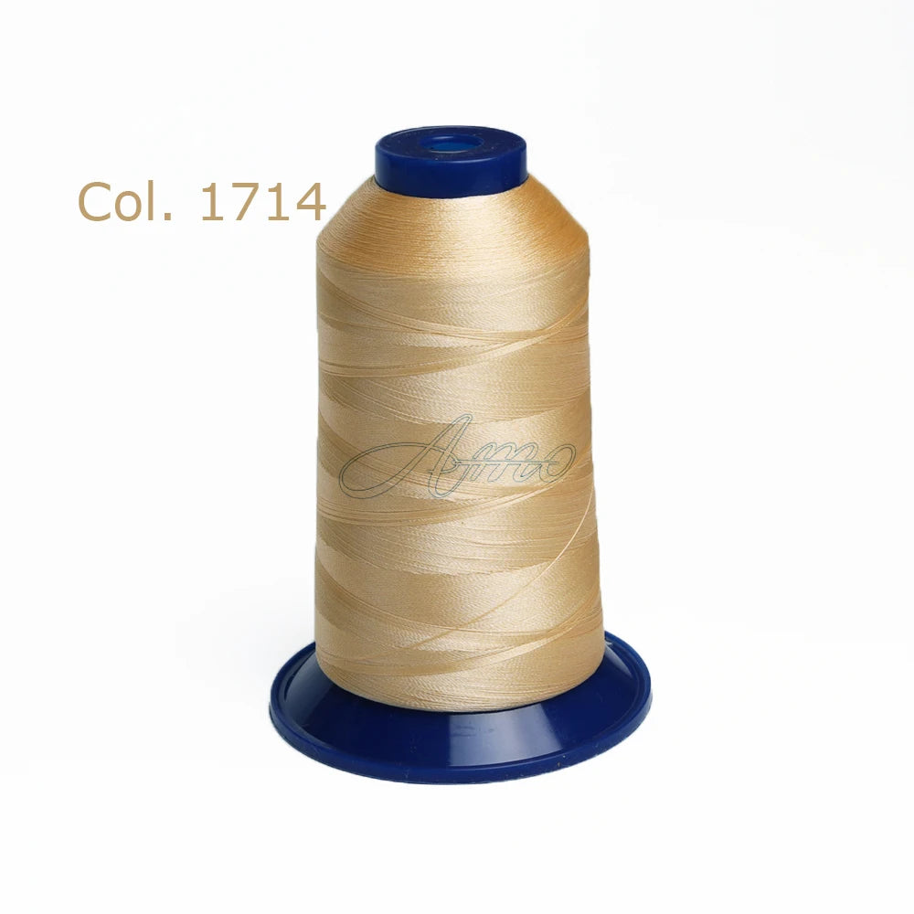 Spool of gold-colored high tenacity polyester embroidery thread labeled Col. 1714