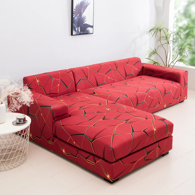 A vibrant red sofa protector cover featuring a geometric cracked pattern displayed on a modern living room sofa.