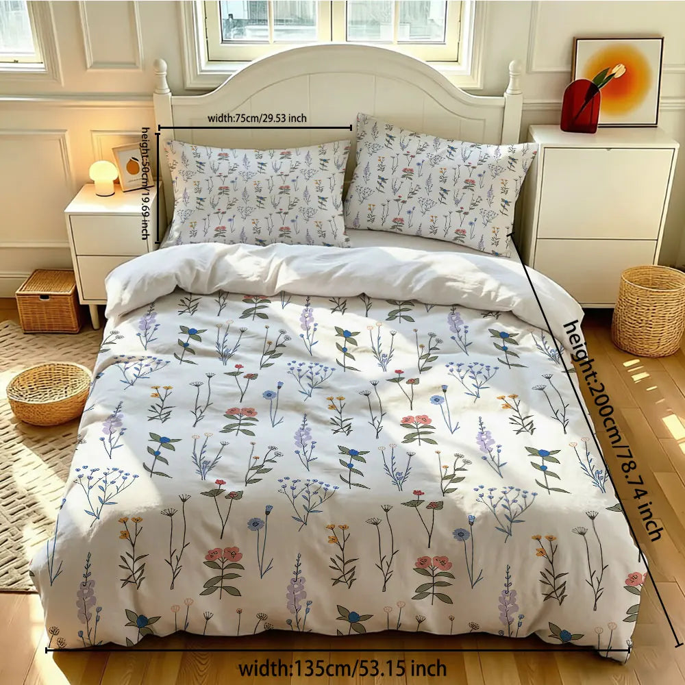 A white hand-painted floral duvet cover set displayed on a bed with light wood furniture.