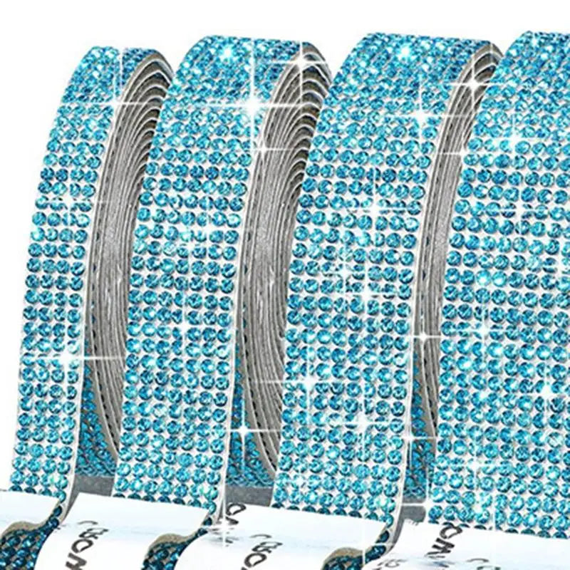 Rolls of blue crystal rhinestone sticker ribbon with diamond trim for crafts and decor