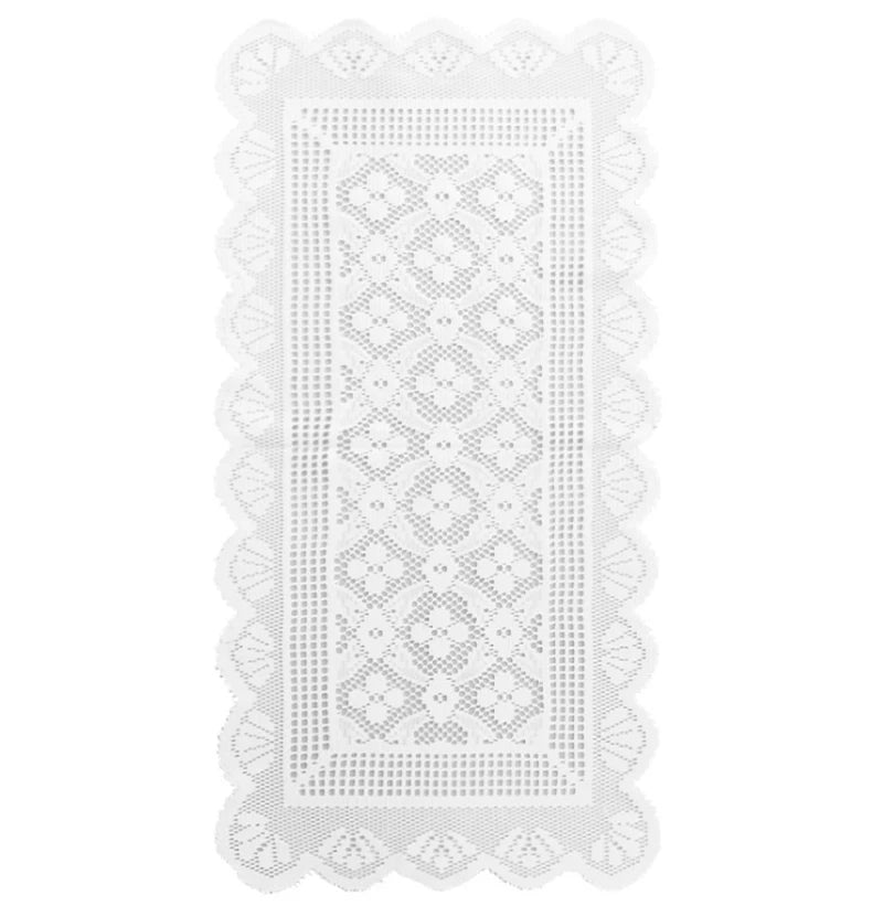 White lace table runner with a decorative geometric pattern and scalloped edges