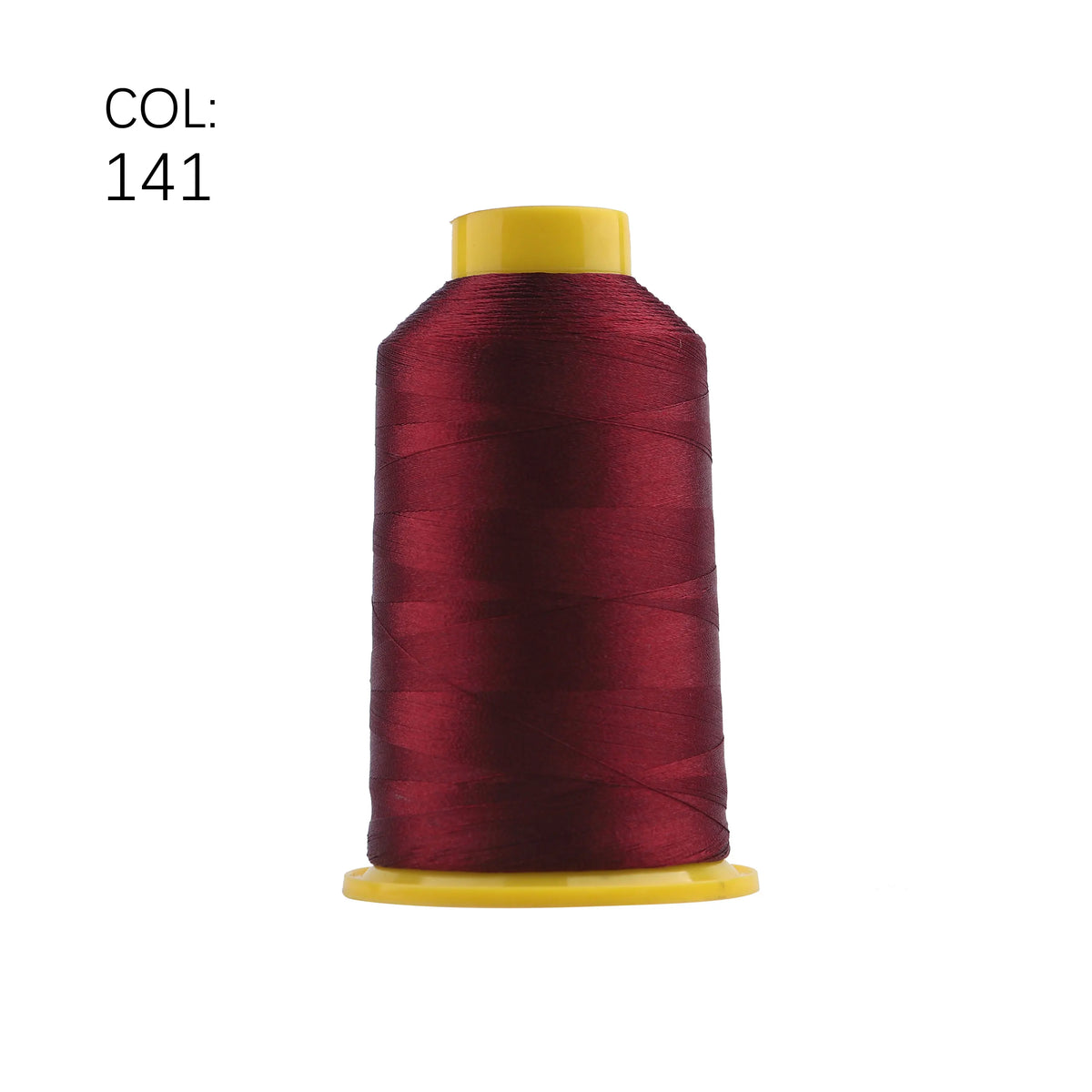 A spool of dark maroon embroidery thread with a yellow core.