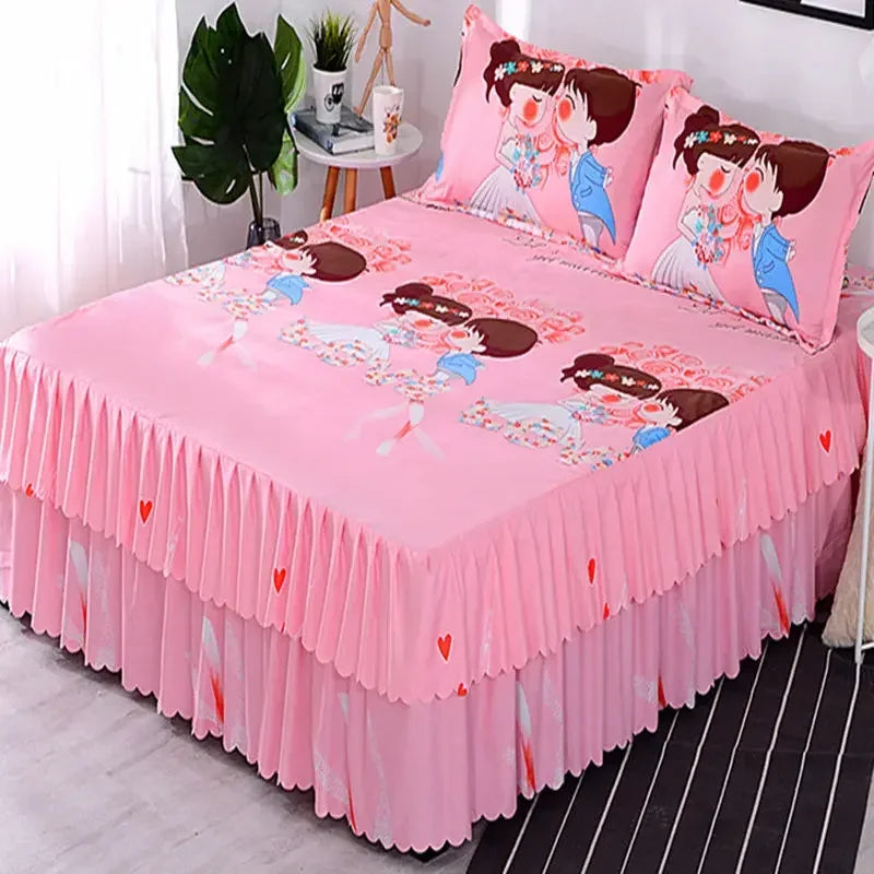 Pink fitted bed sheets with a floral pattern and elastic lace trim, displayed on a bed.