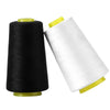 A spool of black polyester sewing thread next to a spool of white polyester sewing thread.