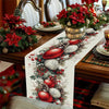 A linen table runner featuring a festive design of pine cones, red berries, and greenery for Christmas decor.