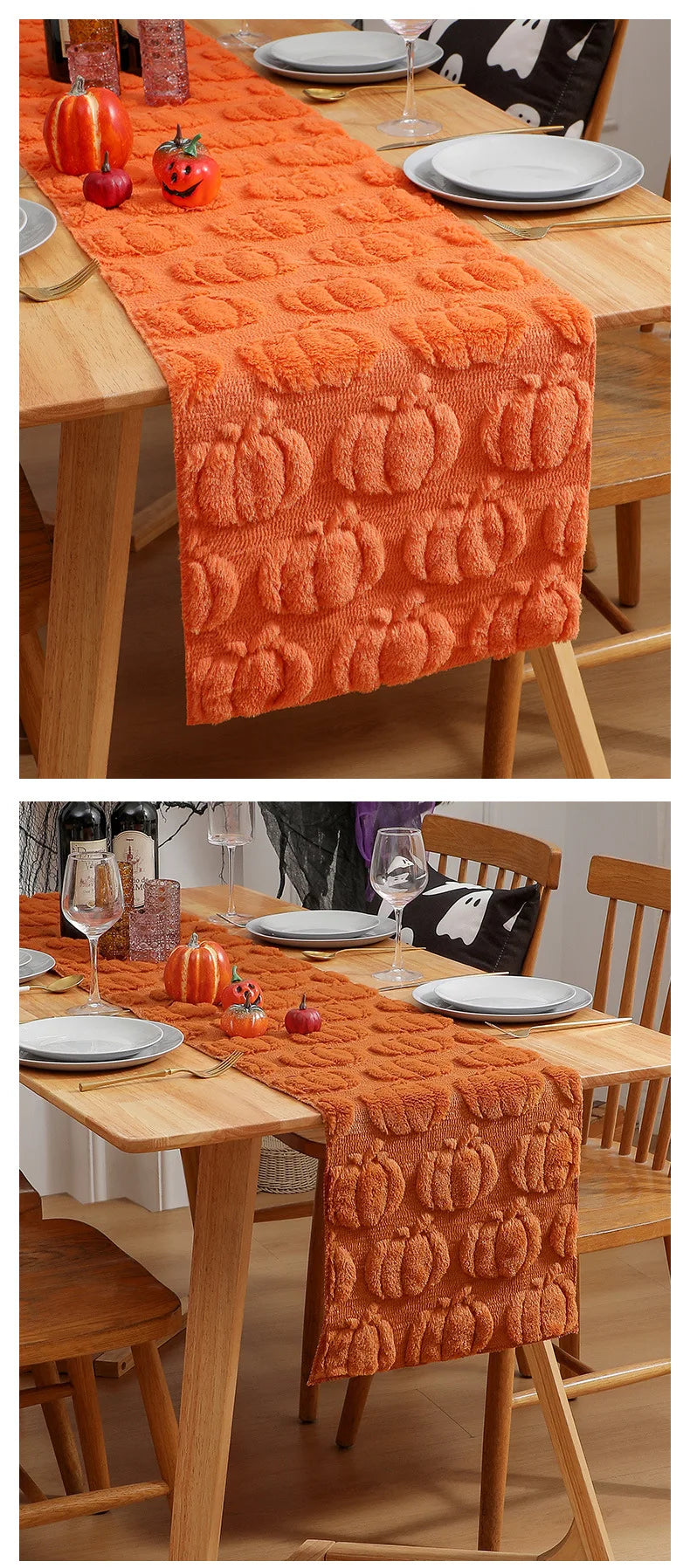 An orange textured table runner with pumpkin designs is laid on a wooden dining table set for a festive meal.
