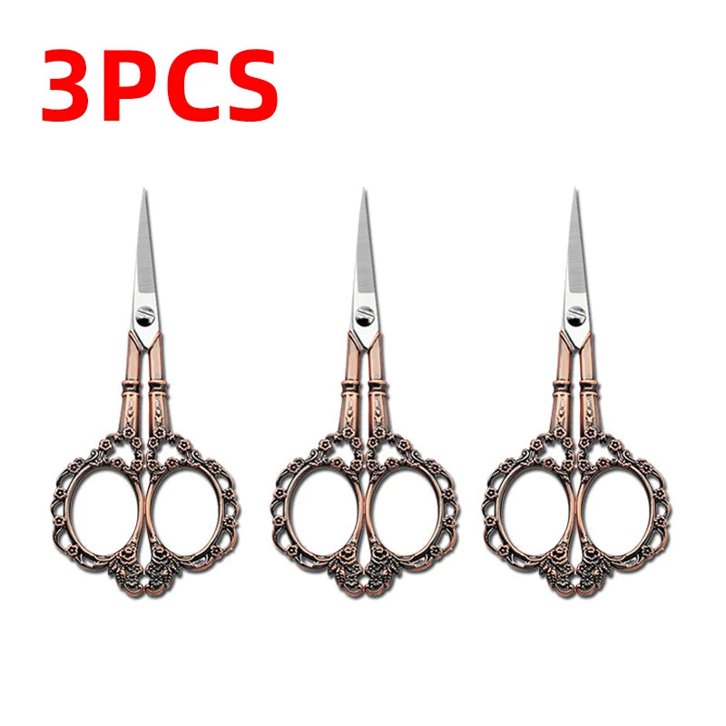 Three pairs of durable stainless steel crafting scissors with ornate handles