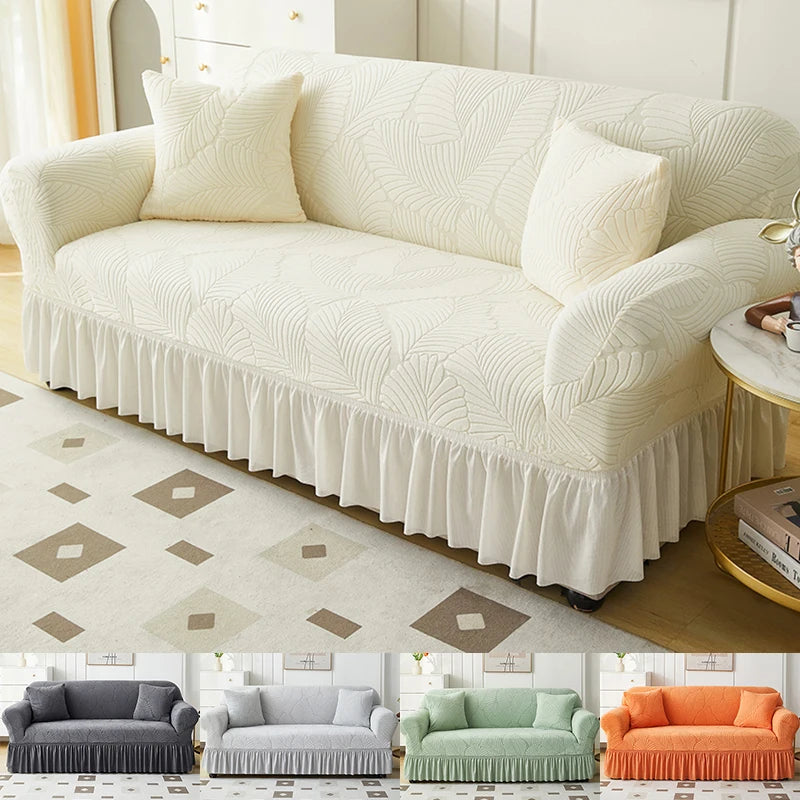 A collection of three upholstered sofas in various colors and fabrics with ruffled skirts.