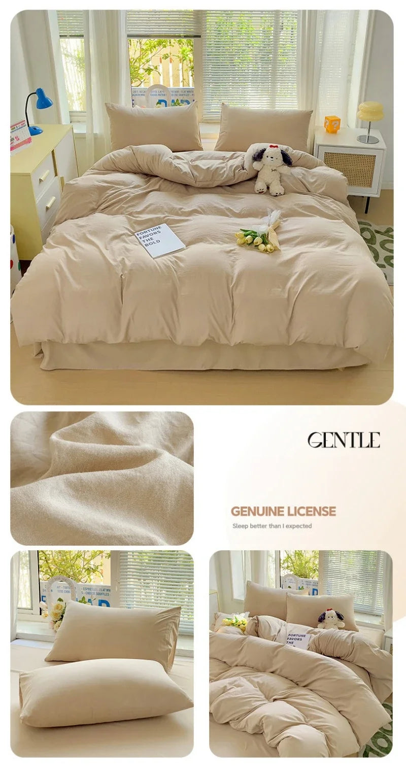 A beige solid cotton bed linen set featuring a duvet, pillows, and decorative elements on a light wood surface.
