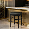A black waterproof PU leather bar stool cover displayed in a modern setting with gold accents.