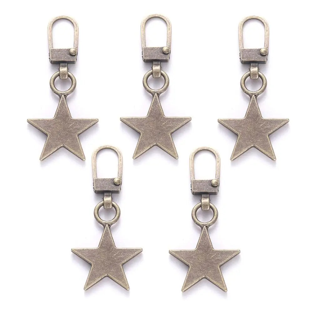 A set of five metal zipper pull replacement kits featuring star-shaped charms.