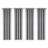 Set of four grey linen textured blackout curtains hanging on a rod.
