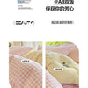 A set of soft striped checkered duvet covers in pink and cream colors shown in close-up.