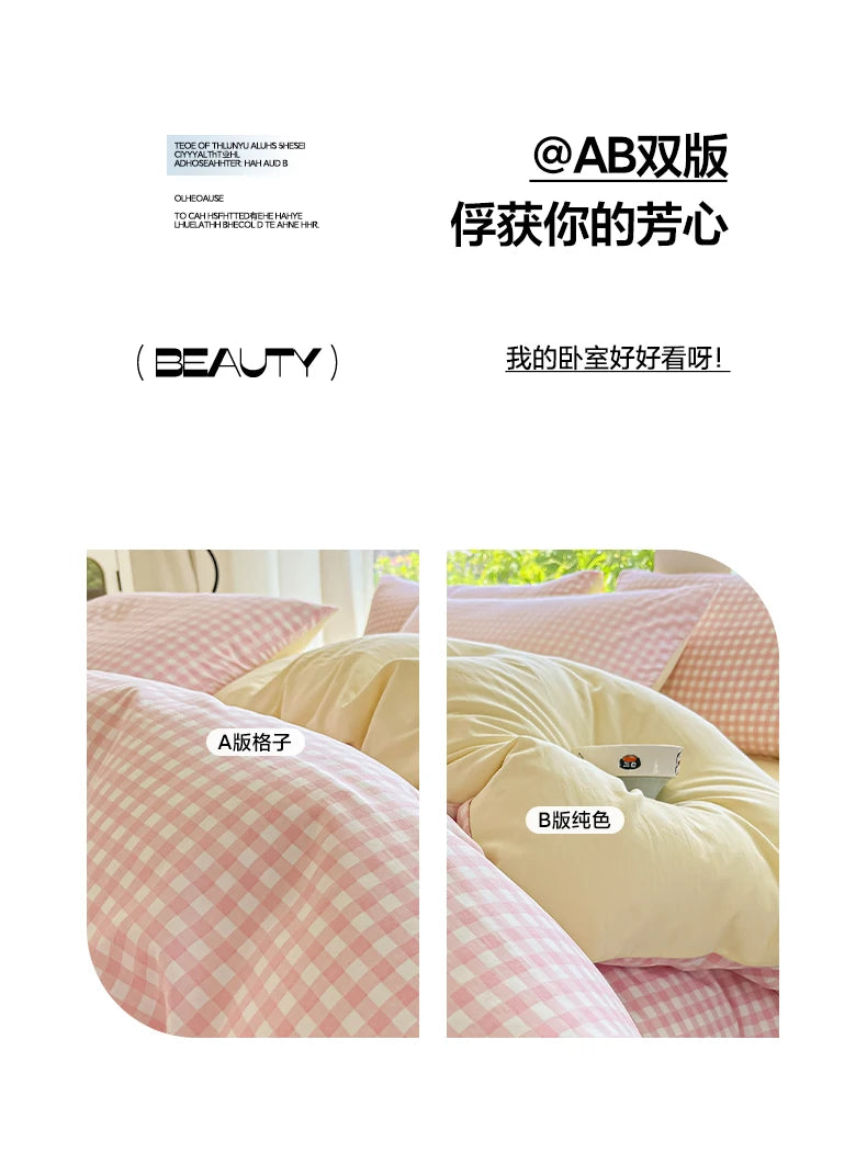 A set of soft striped checkered duvet covers in pink and cream colors shown in close-up.
