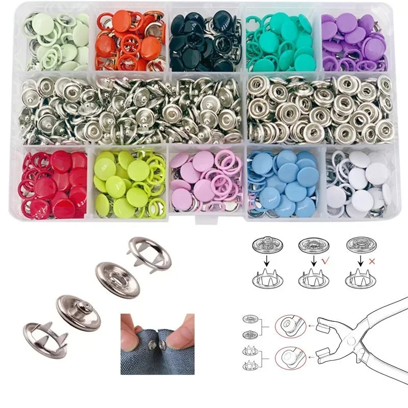 A collection of colorful metal sewing buttons and various tools for crafting and sewing.