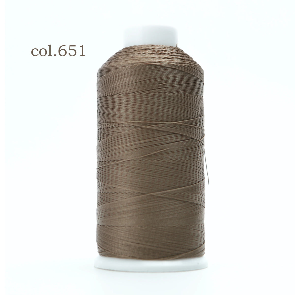 Spool of col.651 heavy duty nylon sewing thread on a white background