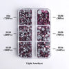 A clear plastic container holds various sizes of light amethyst glass rhinestones categorized by SS6, SS10, SS10, SS30, SS20,