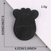 A black embroidered leather patch shaped like a cow's head with a self-adhesive backing.