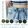 A close-up of denim jeans showing three decorative metal buttons used for clothing.
