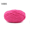 A ball of bright pink matte chenille yarn for knitting and crochet