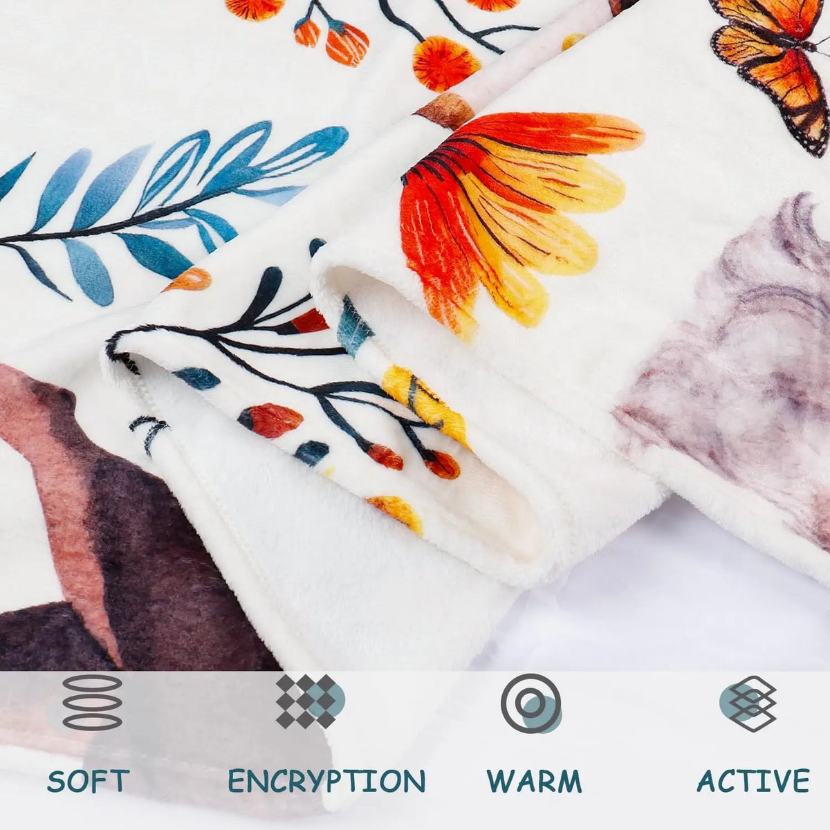 Close-up of a white flannel blanket featuring floral and botanical patterns in orange, blue, and brown tones.