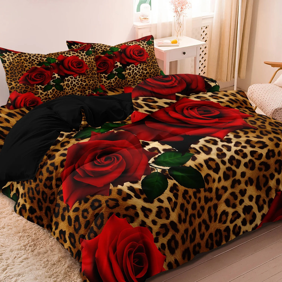 A bed covered with a luxury animal print bedding set featuring large red roses and leopard print fabric.