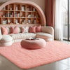 A plush pink bedroom carpet with a fluffy texture is displayed in a bright room.