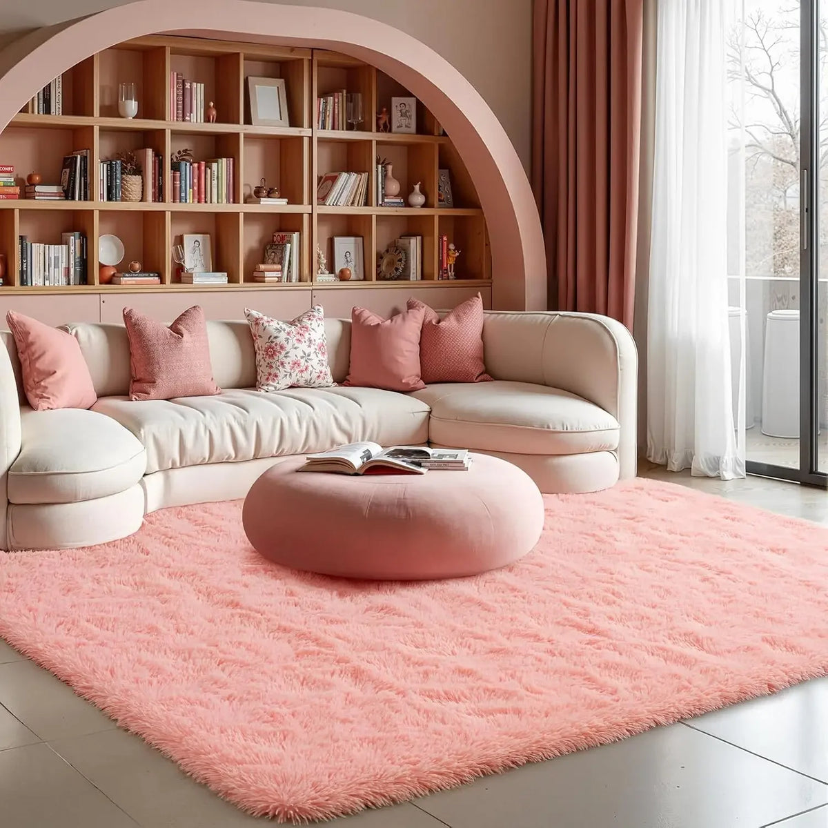 A plush pink bedroom carpet with a fluffy texture is displayed in a bright room.