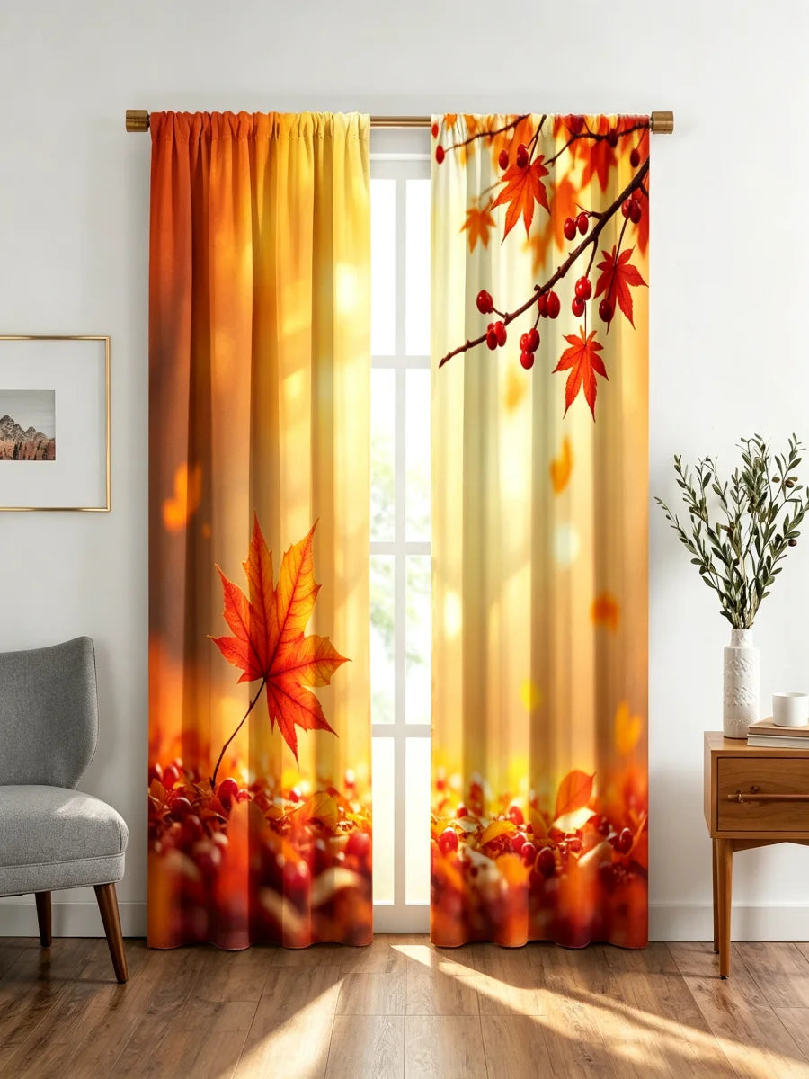 A set of two sheer curtains featuring an autumn maple leaf print with red and orange tones, hanging in a light-filled room.