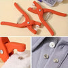Orange precision snap button kit with various sizes of buttons shown on a light background.