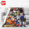 A colorful flannel throw blanket featuring various Dragon Ball Z anime characters.