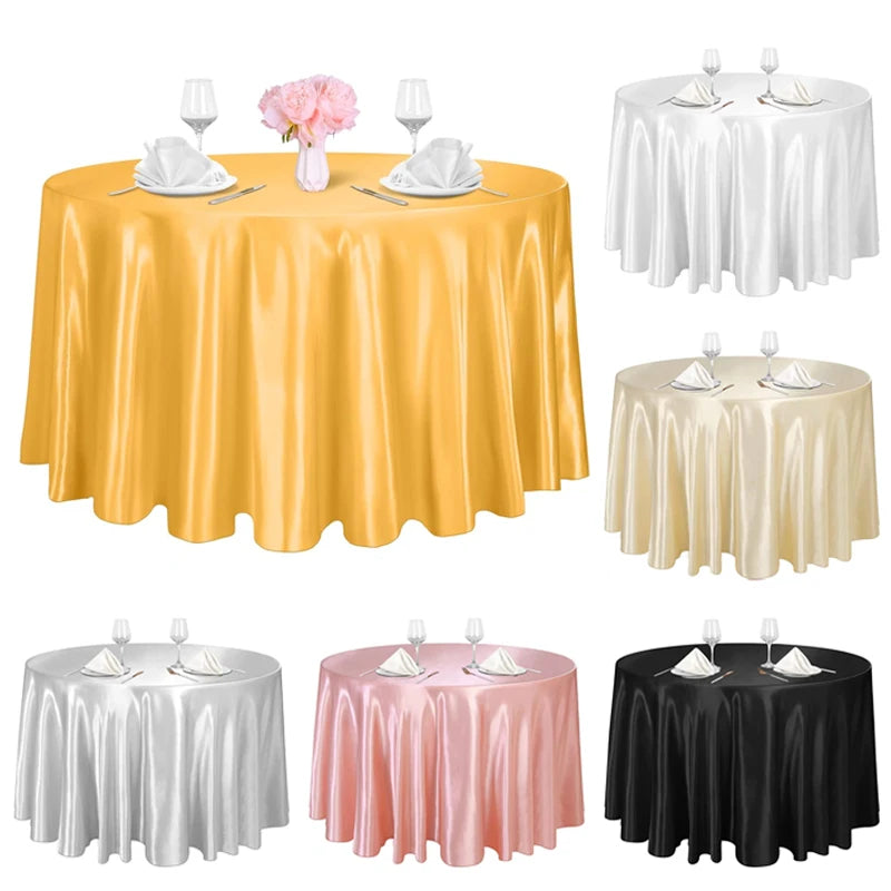 A set of elegant satin round tablecloths in yellow, white, and black, displayed for events.