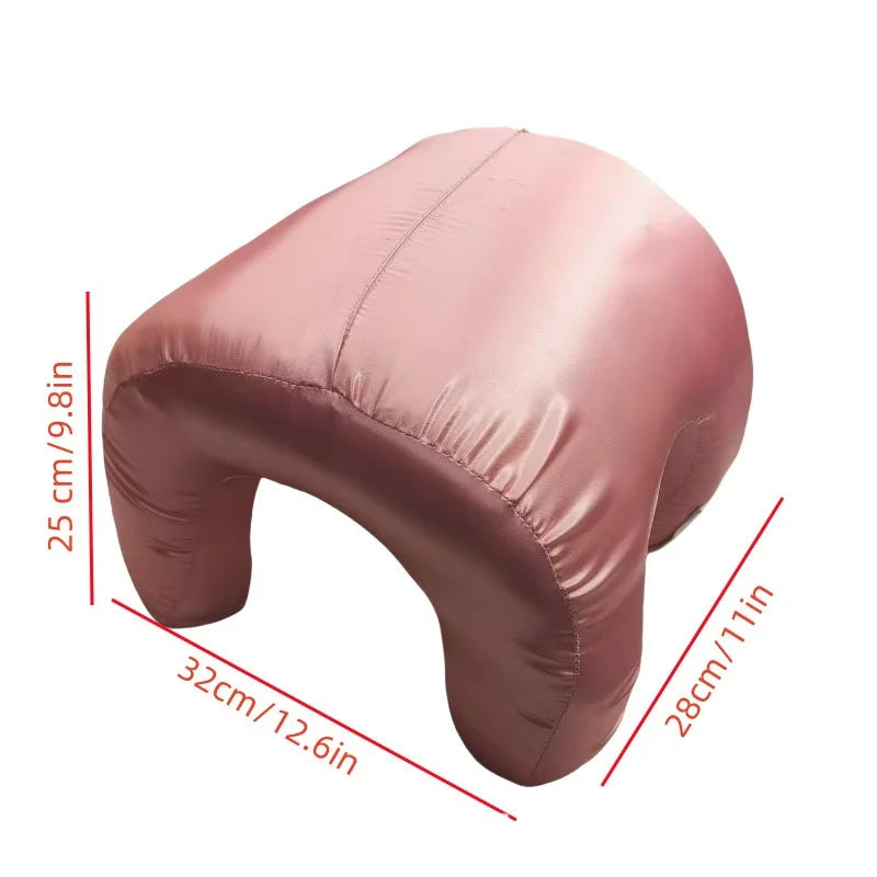 A pink satin anti-wrinkle pillow shown from the side with dimensions marked.