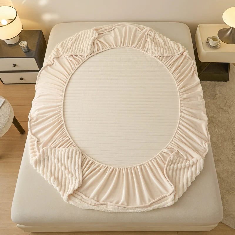 A beige plush rabbit winter fitted bed sheet set displayed on a light-colored bed.