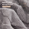 Close-up of a soft, gray faux fur fabric textile used for a luxury non-slip sofa cushion cover.