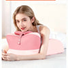 A pink multifunctional bed napping pillow is shown being used for neck and arm support.