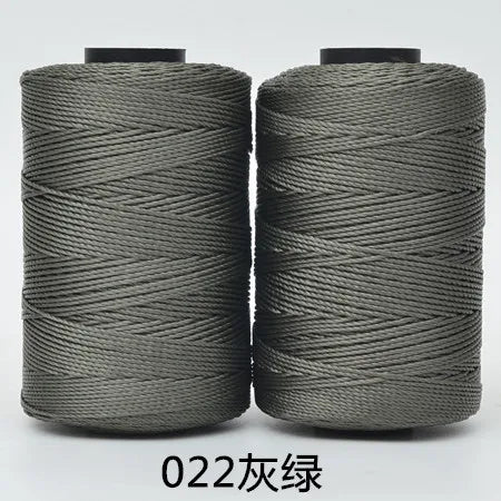 Two spools of gray 022 thread or cord for hand knitting and crochet crafting