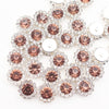 A close-up of sunflower crystal rhinestone sew-on buttons in shades of rose gold and clear silver.