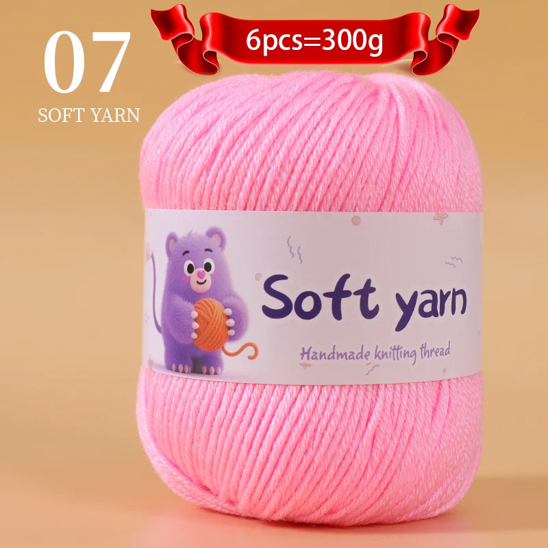 A skein of pink soft yarn labeled as 6 pieces weighing 300 grams for handmade knitting thread.