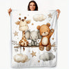 A white flannel blanket featuring watercolor illustrations of a giraffe, an elephant, and a teddy bear.