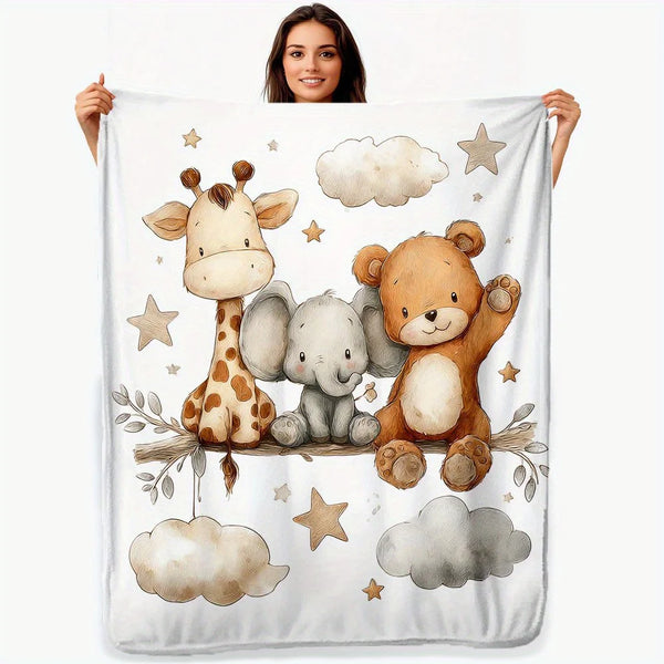 A white flannel blanket featuring watercolor illustrations of a giraffe, an elephant, and a teddy bear.